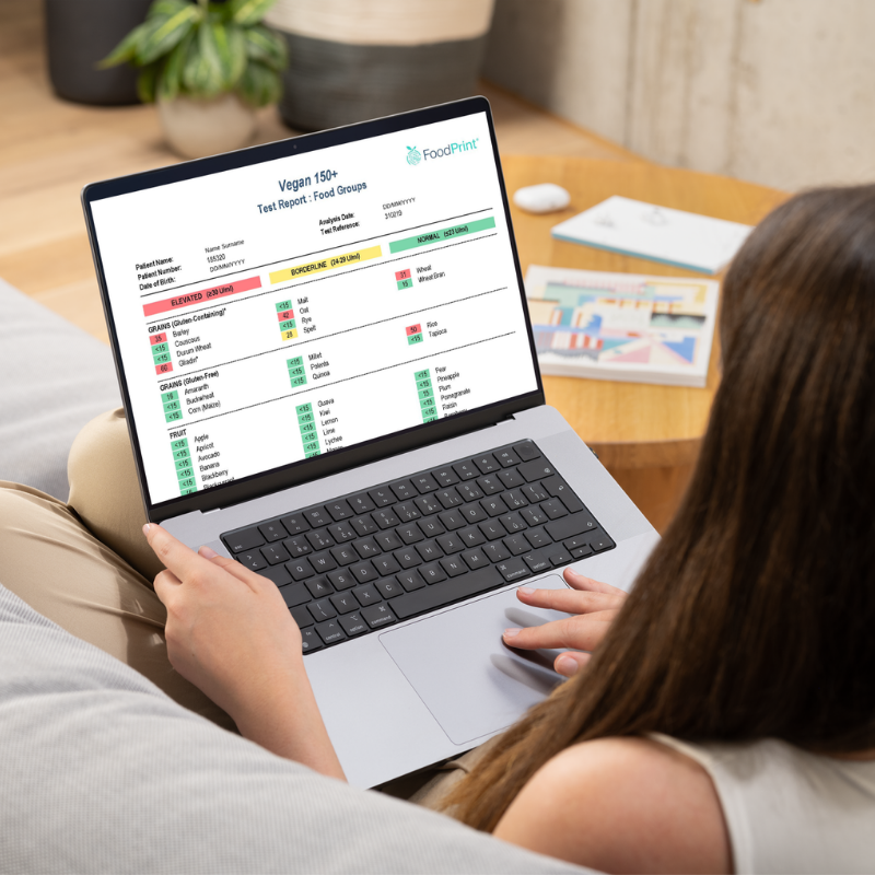 FoodPrint 150 Vegan sample report on laptop