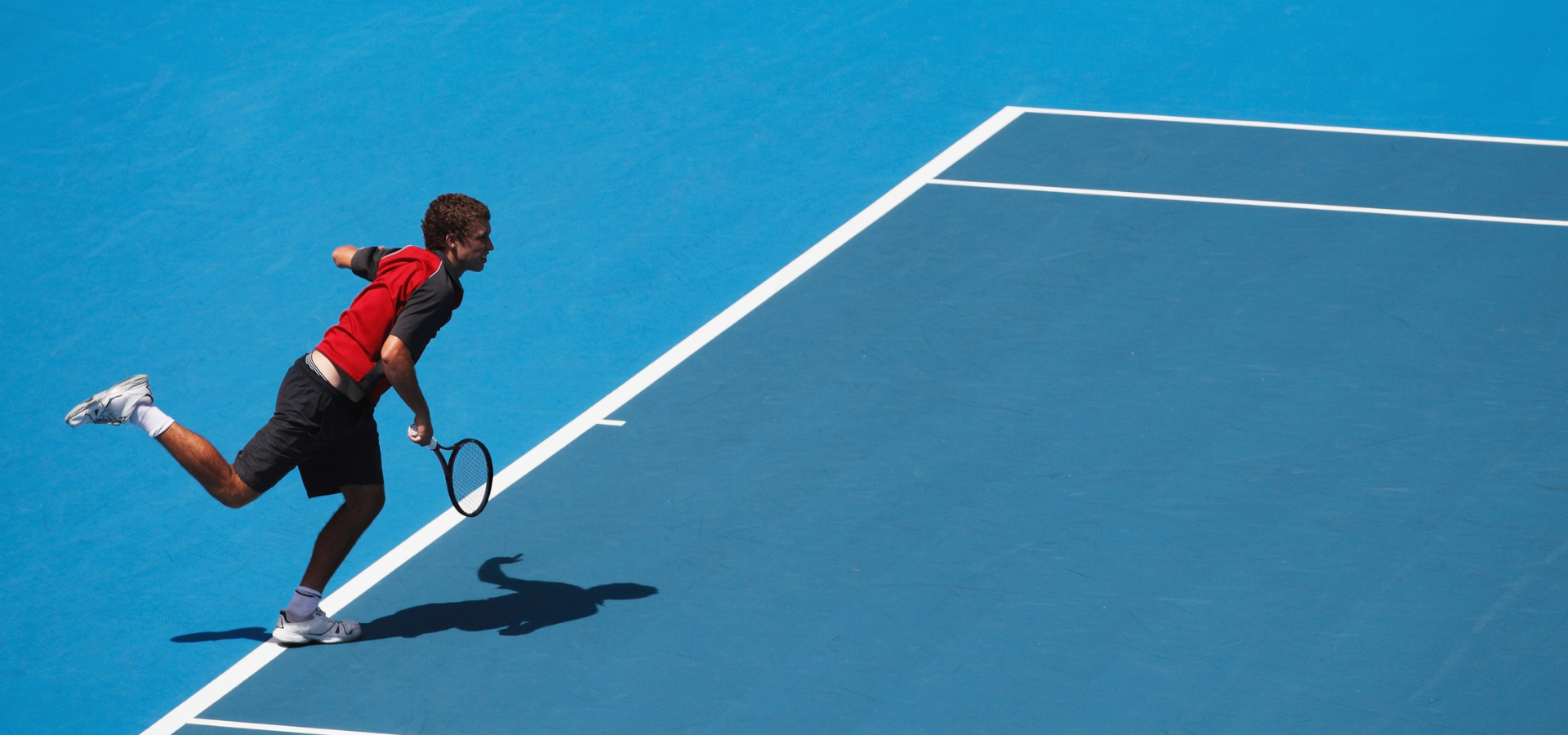 Young man playing tennis